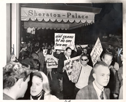 Gathering with several picket signs